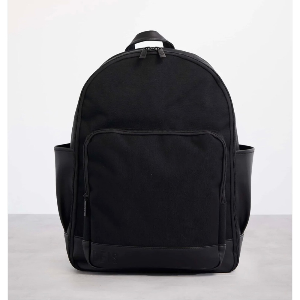 Beis travel backpack. Lots of space with the trolly bypass